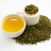 Freshly brewed first flush black tea served with whole leaf tea.